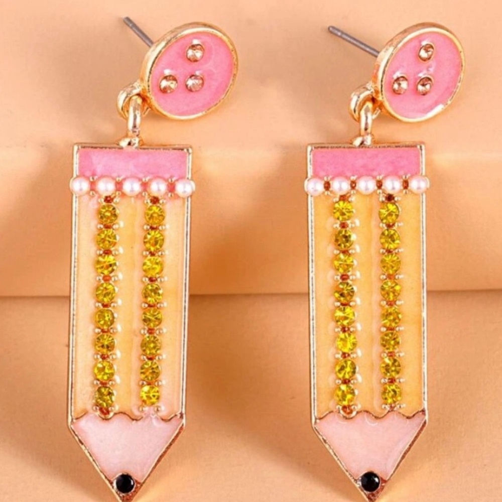 2 pairs of school earrings 👀!! Selling both earring sets together